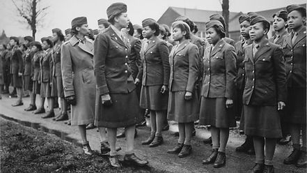 6888 then-Major Charity Adams inspecting